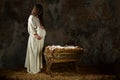 Pregnant Mary Looking at the Manger Royalty Free Stock Photo