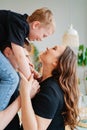 pregnant mom, dad rides son on shoulders. games and relationships with children Royalty Free Stock Photo