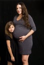 Pregnant mom and daughter