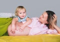 Pregnant mother and daughter together at home. Woman with her first child during second pregnancy. Motherhood and parenting Royalty Free Stock Photo