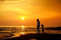 Pregnant mother and her child as silhouettes Royalty Free Stock Photo