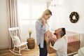 Pregnant Mother and her husband on the baby room at home Royalty Free Stock Photo