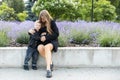 Pregnant mother and her little son spending time together in the park, hugging and smiling Royalty Free Stock Photo