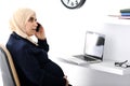 Pregnant Muslim Arabic business woman