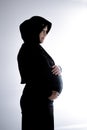 A pregnant Muslim woman from Asia