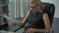 Pregnant office worker feeling strong pain in stomach, risk of misbirth, stress