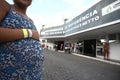 Pregnant is seen facing public maternity