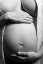 Pregnant tummy of a loving expectant mother Royalty Free Stock Photo