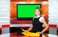 Pregnant tv anchorwoman at tv studio Royalty Free Stock Photo