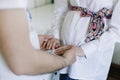 Pregnant wife with husband. Man touching belly of pregnant woman. Family couple waiting for baby. Royalty Free Stock Photo