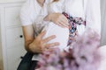 Pregnant wife with husband. Man touching belly of pregnant woman. Family couple waiting for baby. Royalty Free Stock Photo