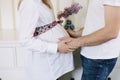 Pregnant wife with husband. Man touching belly of pregnant woman. Family couple waiting for baby. Royalty Free Stock Photo
