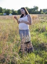 Pregnant woman with apple Royalty Free Stock Photo