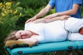 Pregnant woman arm massage by physical therapist