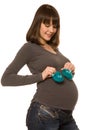 Pregnant woman with baby bootee Royalty Free Stock Photo