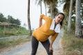 Pregnant woman back pain during exercising outdoor Royalty Free Stock Photo