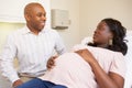 Pregnant Woman Being Given Ante Natal Check By Doctor Royalty Free Stock Photo