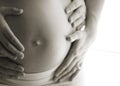 Pregnant woman belly exposed Royalty Free Stock Photo