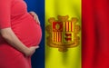 Pregnant woman belly on flag of Principality of Andorra background