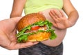 Pregnant woman with belly refused to eat a burger