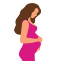 Pregnant woman with a big belly. Girl with long hair and in a dress. The joy of motherhood. Waiting for the birth of a child.