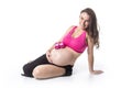 Pregnant woman belly over white background Royalty Free Stock Photo