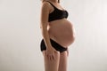 Pregnant woman in black underware Royalty Free Stock Photo