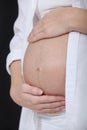 Pregnant woman caressing her belly Royalty Free Stock Photo