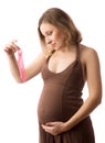 Pregnant woman with the condom Royalty Free Stock Photo