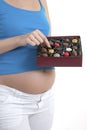 Pregnant woman craving chocolates Royalty Free Stock Photo