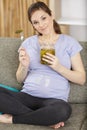 pregnant woman craving for pickled gherkins Royalty Free Stock Photo