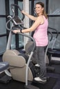 Pregnant woman on crosstrainer