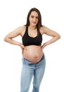 Pregnant woman upset with her too tight jeans Royalty Free Stock Photo