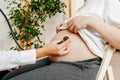 Pregnant woman at the doctor& x27;s appointment. Close-up. Royalty Free Stock Photo