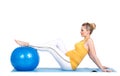 A pregnant woman does gymnastics with ball Royalty Free Stock Photo