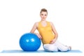 A pregnant woman does gymnastics with ball Royalty Free Stock Photo