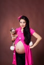 Pregnant woman with dog