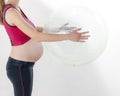 Pregnant woman doing exercises Royalty Free Stock Photo