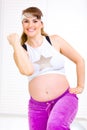 Pregnant woman doing fitness exercises Royalty Free Stock Photo