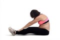 Pregnant woman doing floor exercises on white background Royalty Free Stock Photo