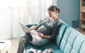 Pregnant woman doing online shopping Royalty Free Stock Photo