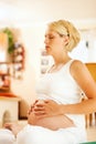 Pregnant woman doing pregnancy yoga Royalty Free Stock Photo