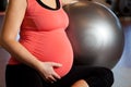 Pregnant woman doing relaxation exercise