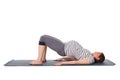 Pregnant woman doing yoga asana Purvottanasana Royalty Free Stock Photo