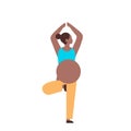 Pregnant woman doing yoga exercises african american girl working out fitness pregnancy healthy lifestyle concept female