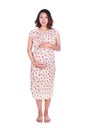 Pregnant woman in dress isolated on white background Royalty Free Stock Photo