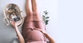 Pregnant woman in dress with ultrasound image. Expectant mother waiting and preparing for baby birth during pregnancy Royalty Free Stock Photo