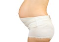 Pregnant woman dressed maternity girdle