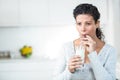 Pregnant woman drinking a glass of milk Royalty Free Stock Photo