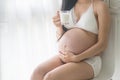 The pregnant woman drinking milk Royalty Free Stock Photo